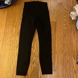 Lululemon black wonder- under leggings, size 4